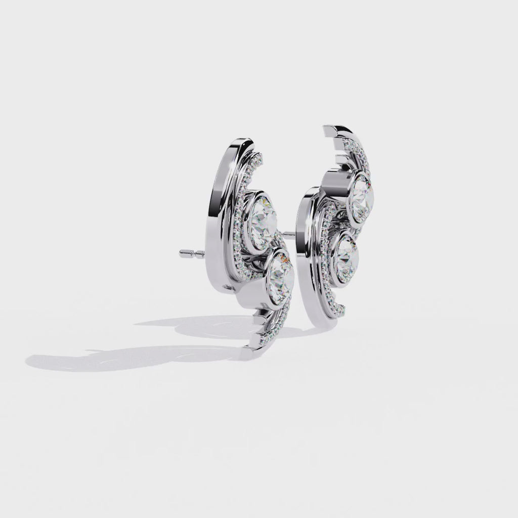 Sterling Silver & CZ Swirl Stud Earrings: A Touch of Modern Elegance Jewelry By Azuni & Company