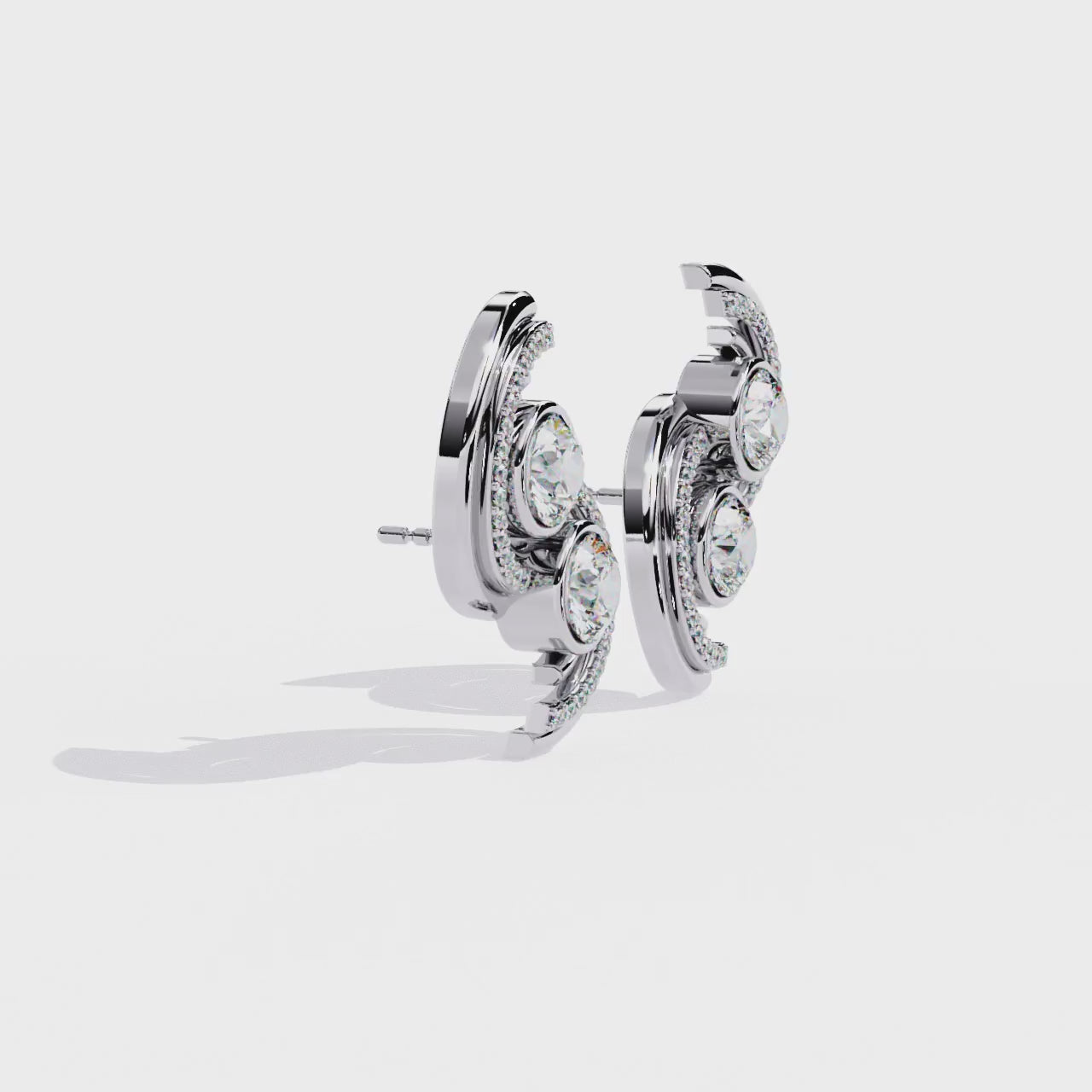 Sterling Silver & CZ Swirl Stud Earrings: A Touch of Modern Elegance Jewelry By Azuni & Company