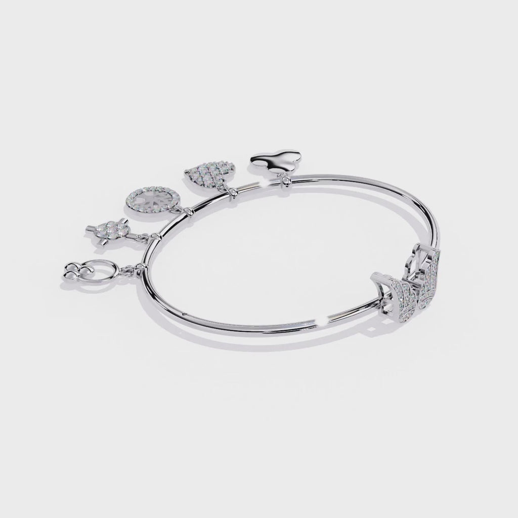 Sparkle & Charm: The Ultimate Sterling Silver Bangle with CZ Charms Jewelry By Azuni & Company