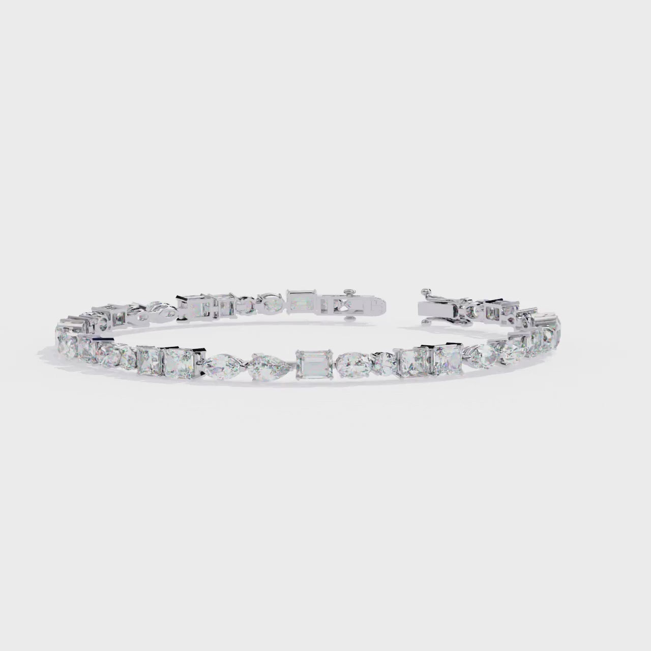 Dazzling Mixed-Shape CZ Tennis Bracelet in Sterling Silver Jewelry By Azuni & Company