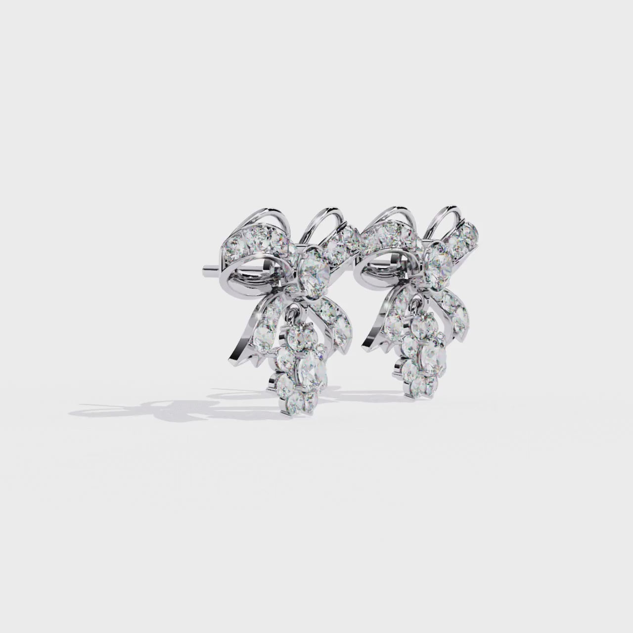 Elegant Bow and Snowflake CZ Stud Drop Earrings Jewelry By Azuni & Company
